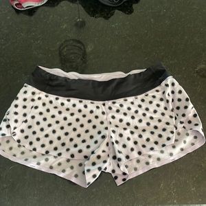 LuLu Lemon size 6 speed shorts light purple with black polka dots